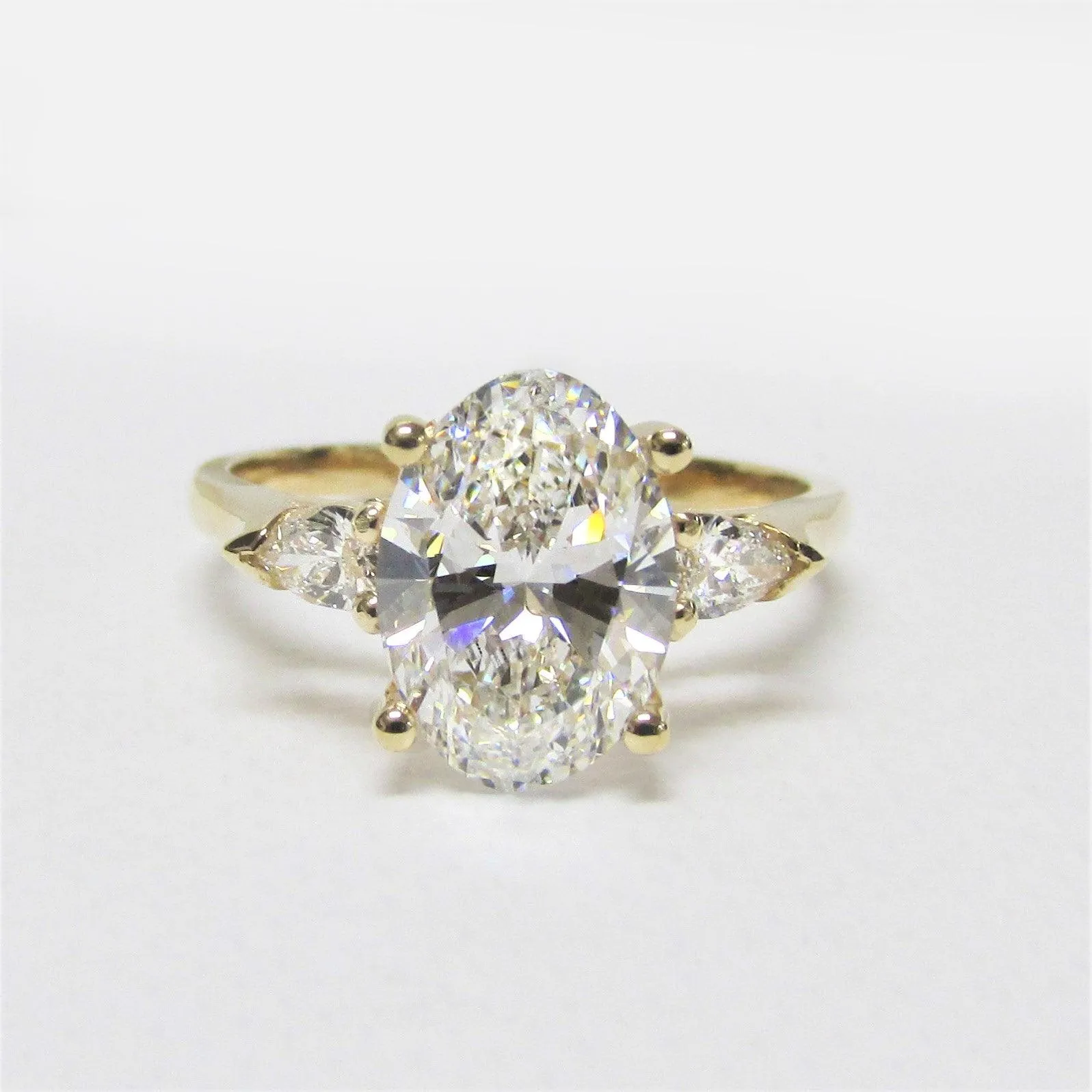 2 carat Oval Diamond Three Stone Pear Shaped Engagement Ring