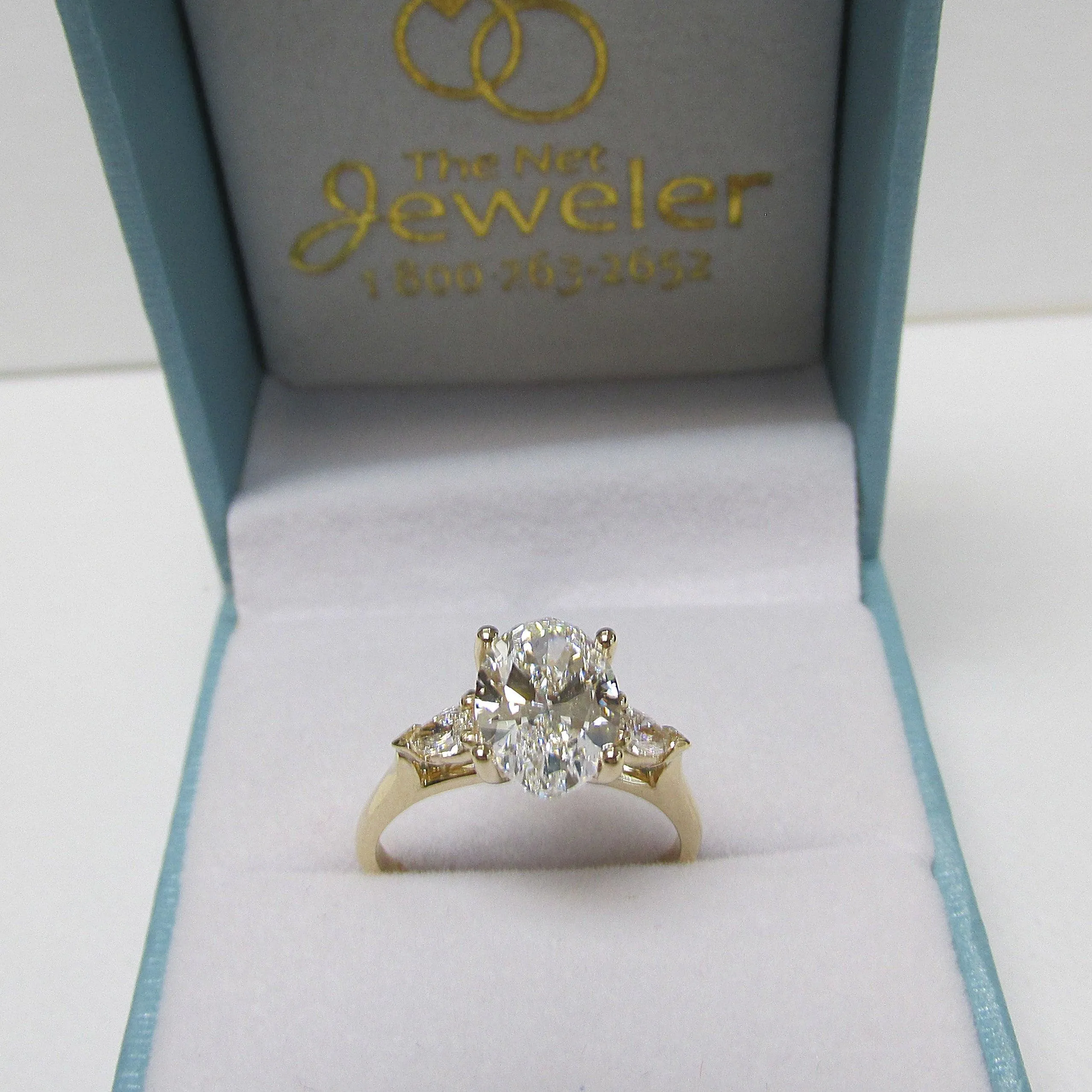 2 carat Oval Diamond Three Stone Pear Shaped Engagement Ring