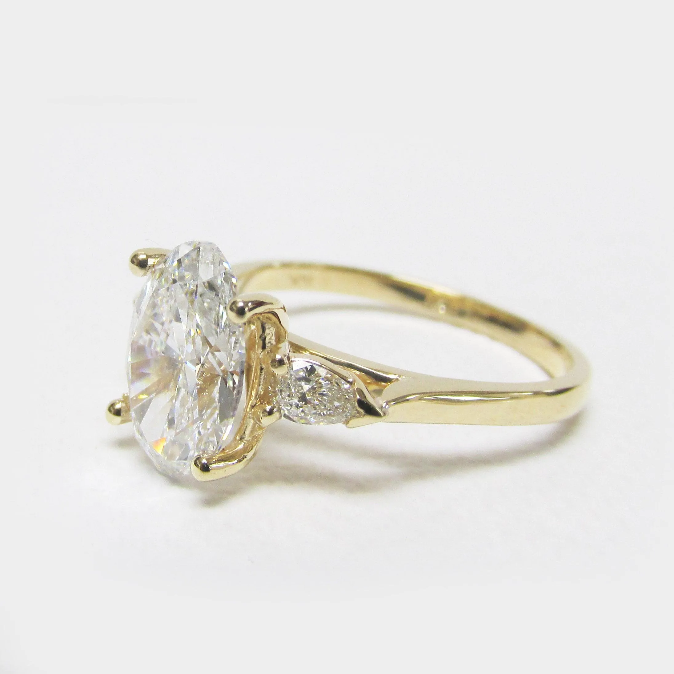2 carat Oval Diamond Three Stone Pear Shaped Engagement Ring