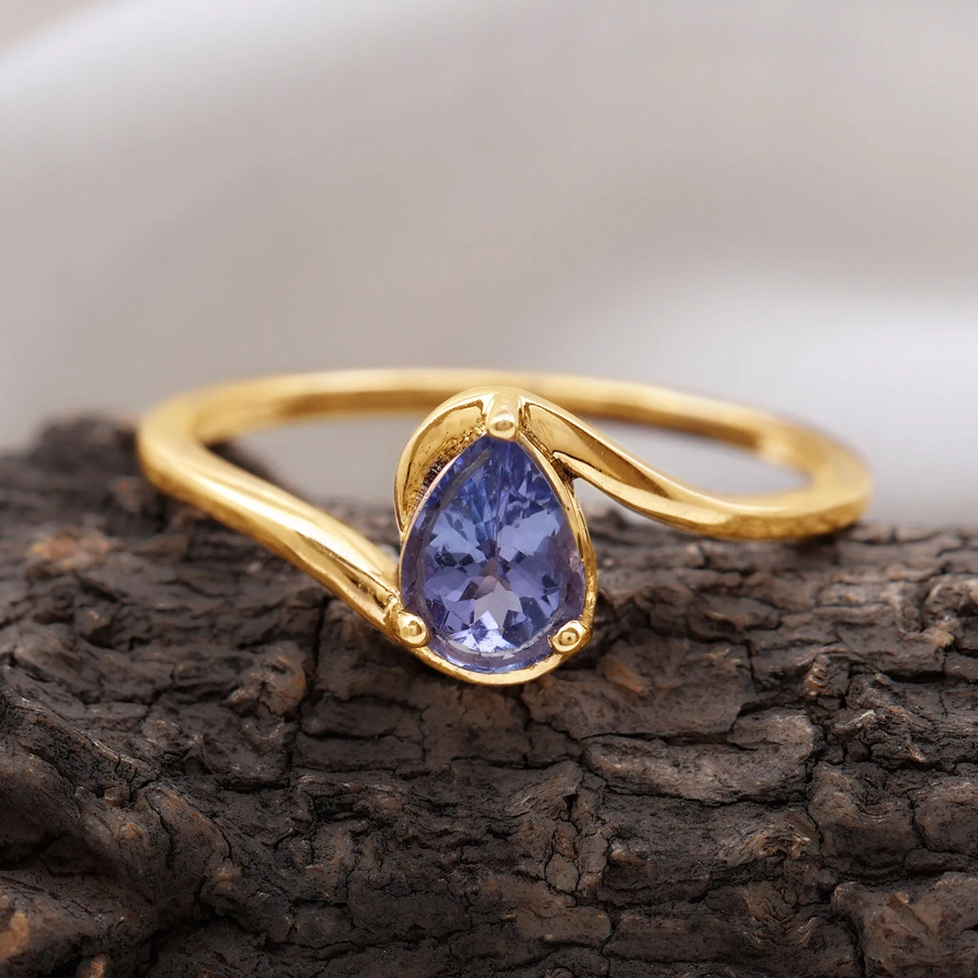 Pear Shape Solitaire Tanzanite Bypass Engagement Ring in Gold