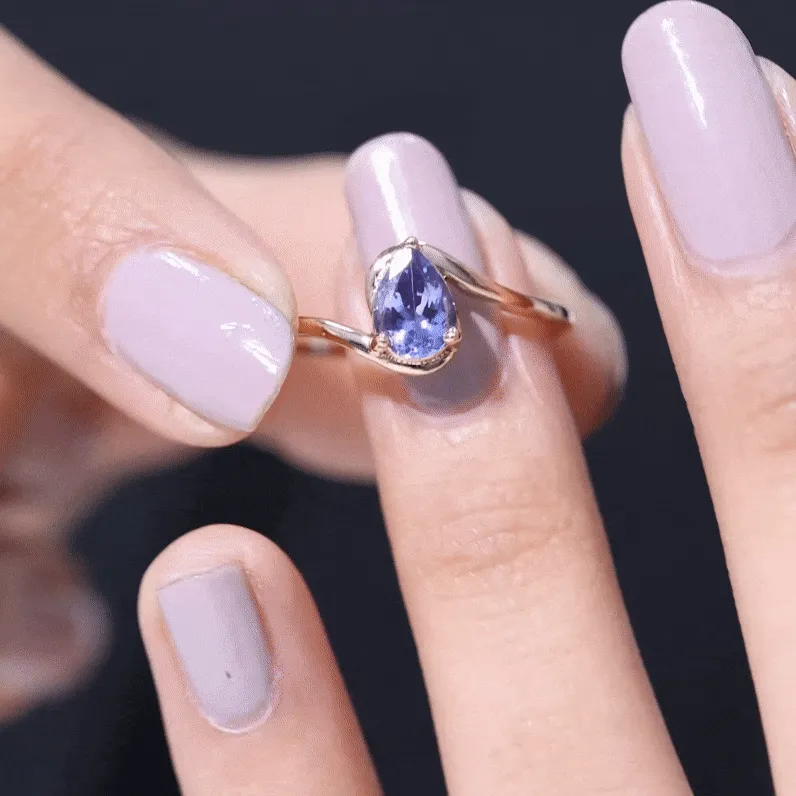 Pear Shape Solitaire Tanzanite Bypass Engagement Ring in Gold