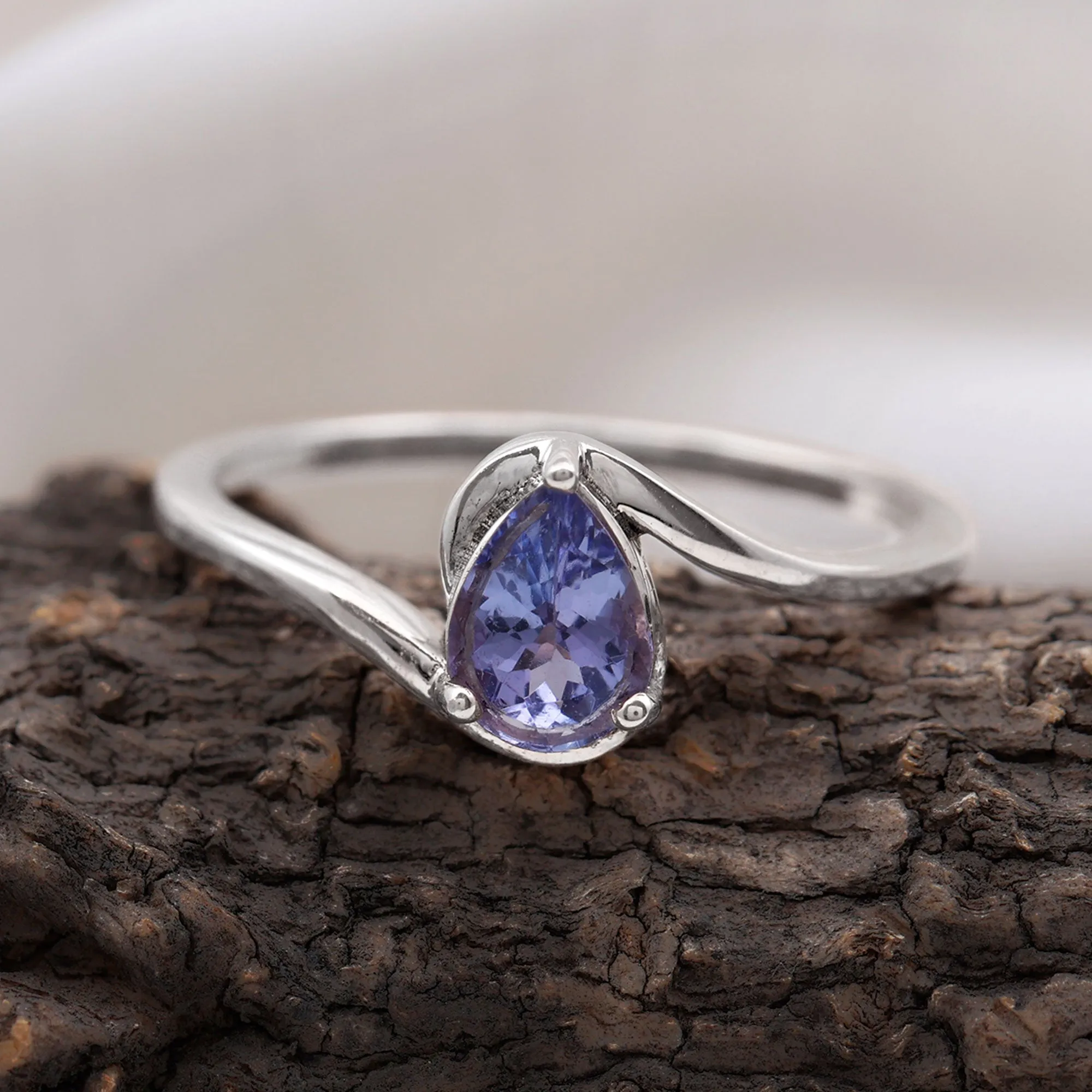 Pear Shape Solitaire Tanzanite Bypass Engagement Ring in Gold