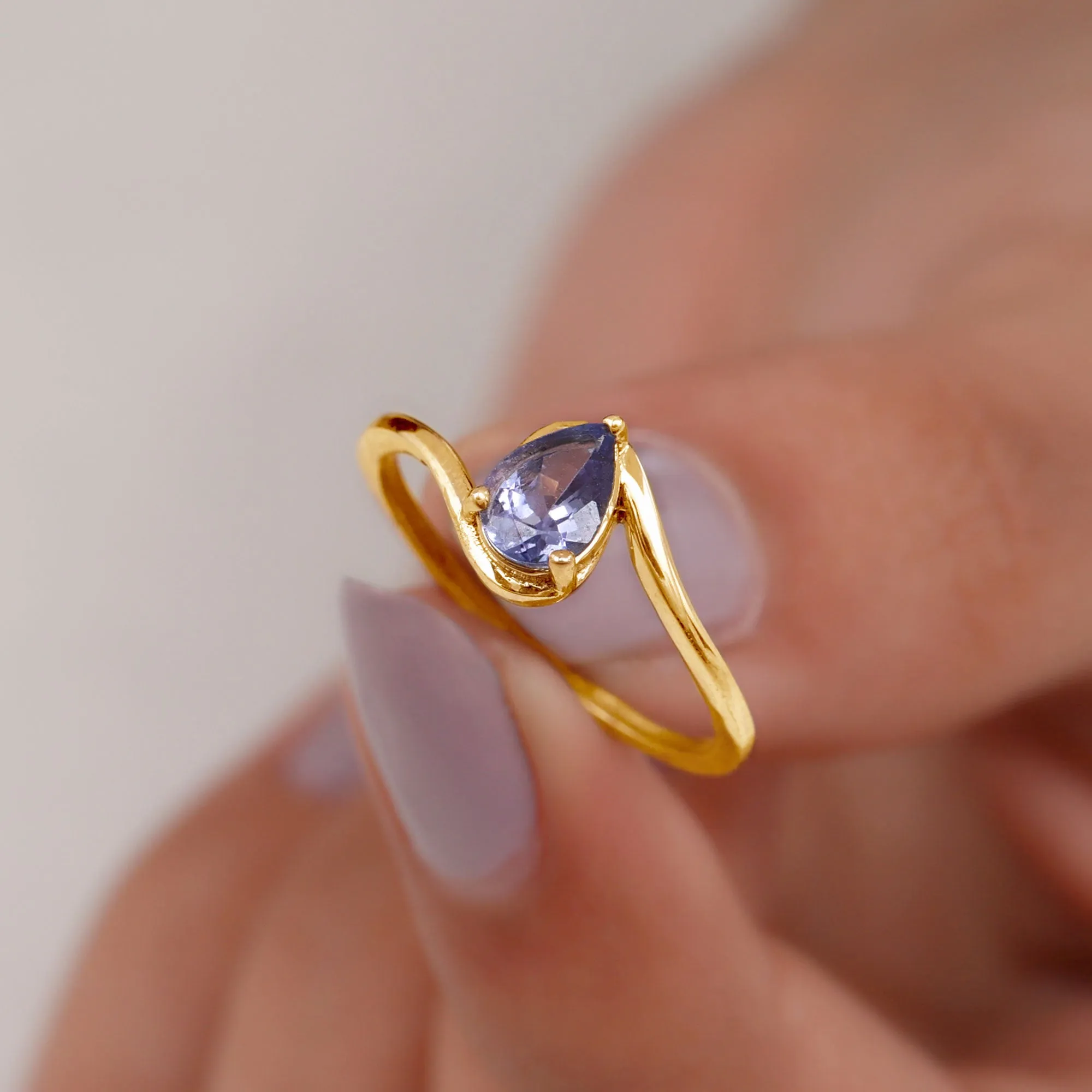 Pear Shape Solitaire Tanzanite Bypass Engagement Ring in Gold