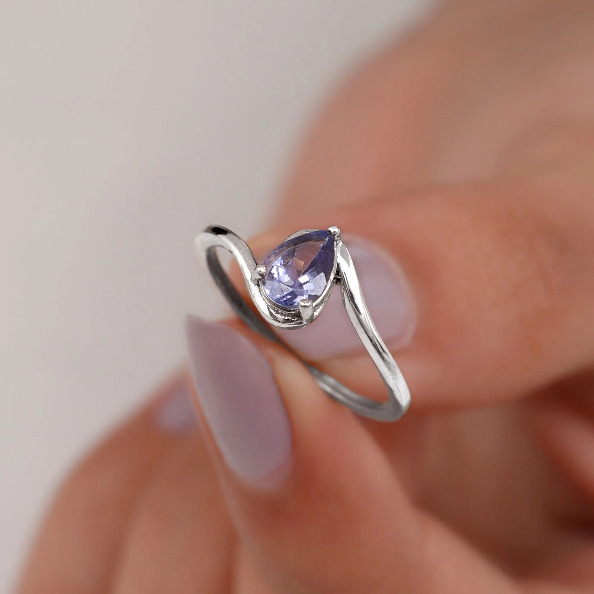 Pear Shape Solitaire Tanzanite Bypass Engagement Ring in Gold