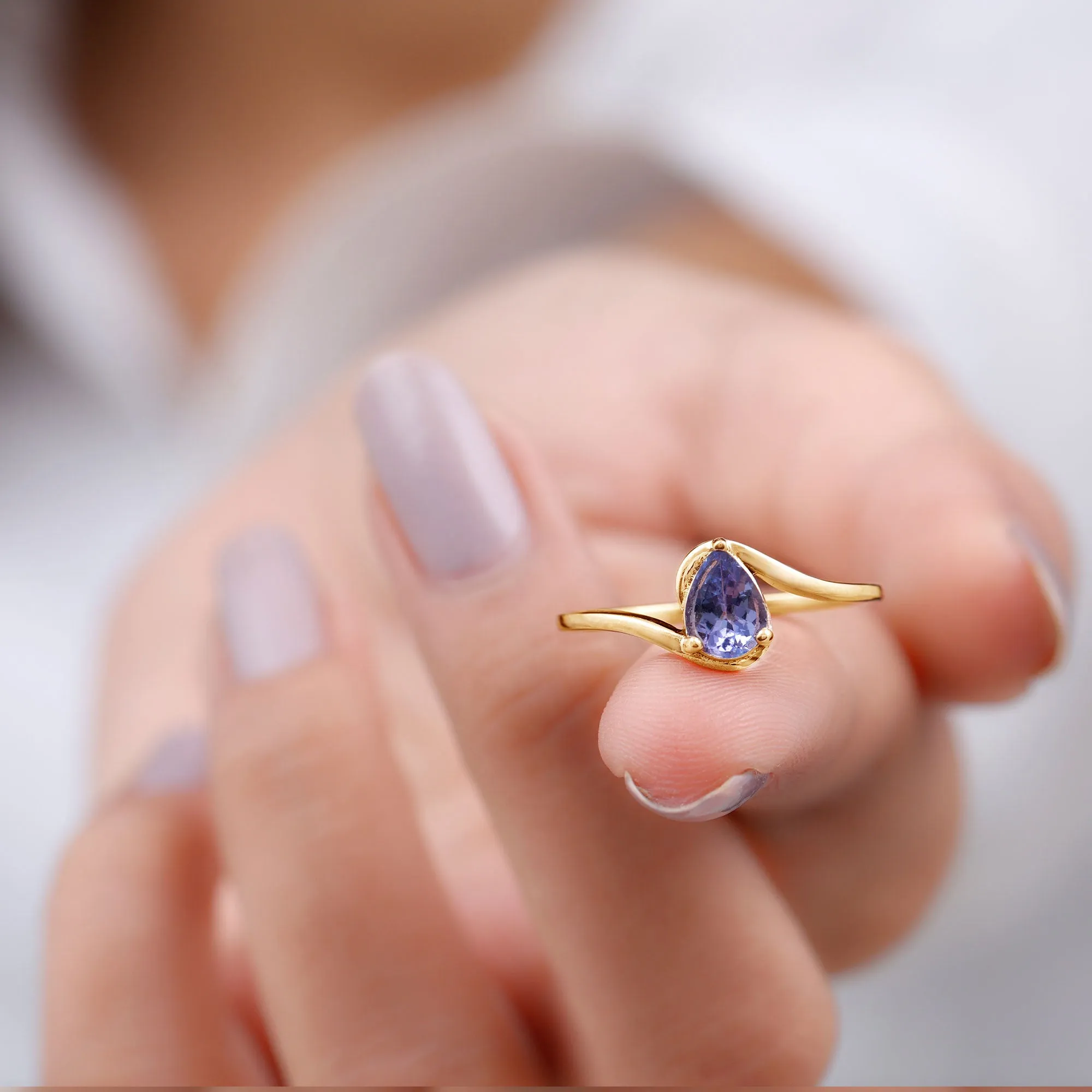 Pear Shape Solitaire Tanzanite Bypass Engagement Ring in Gold